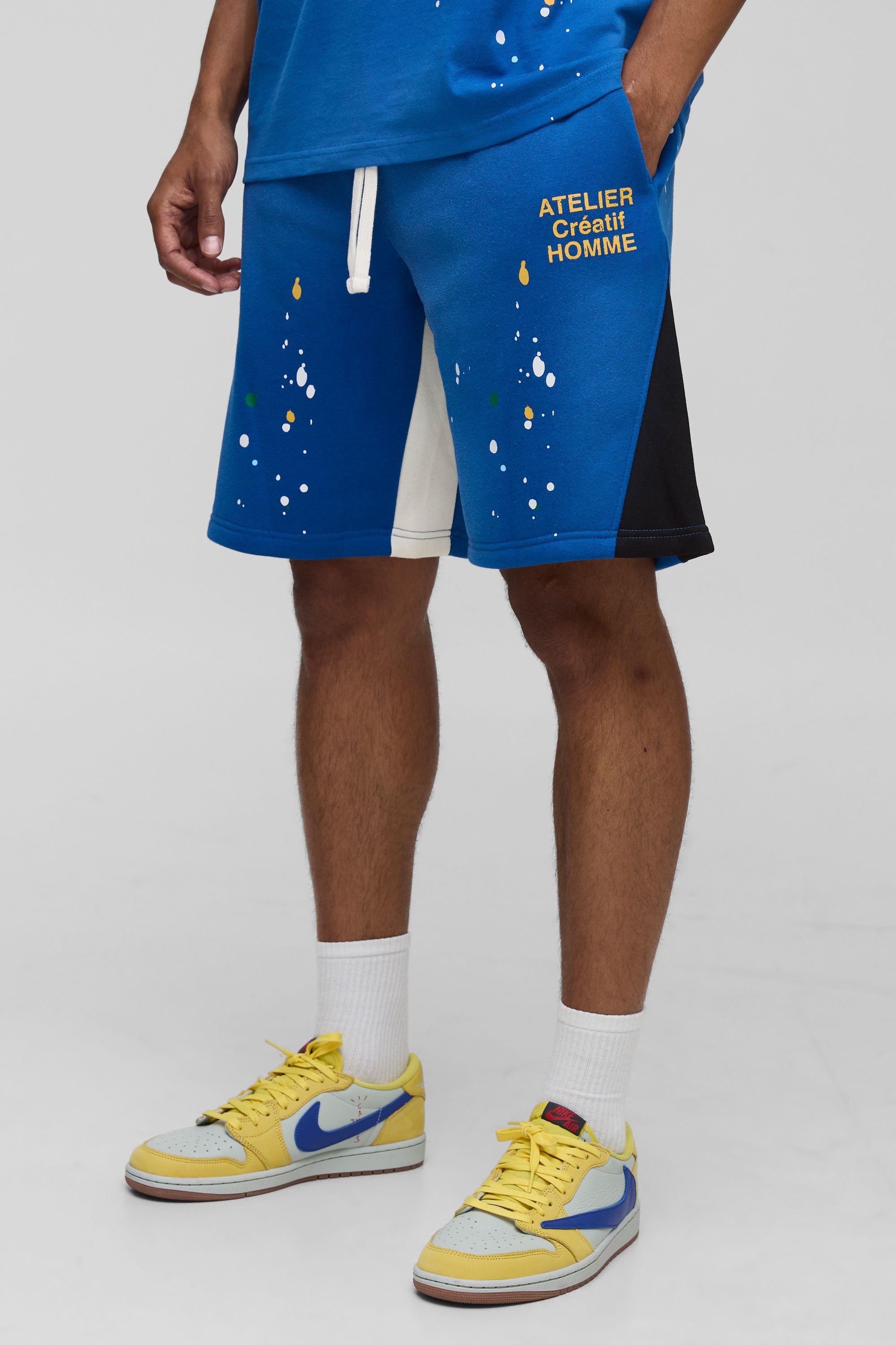 Oversized Washed Paint Splatter Mid Length Gusset Shorts by BOOHOOMAN