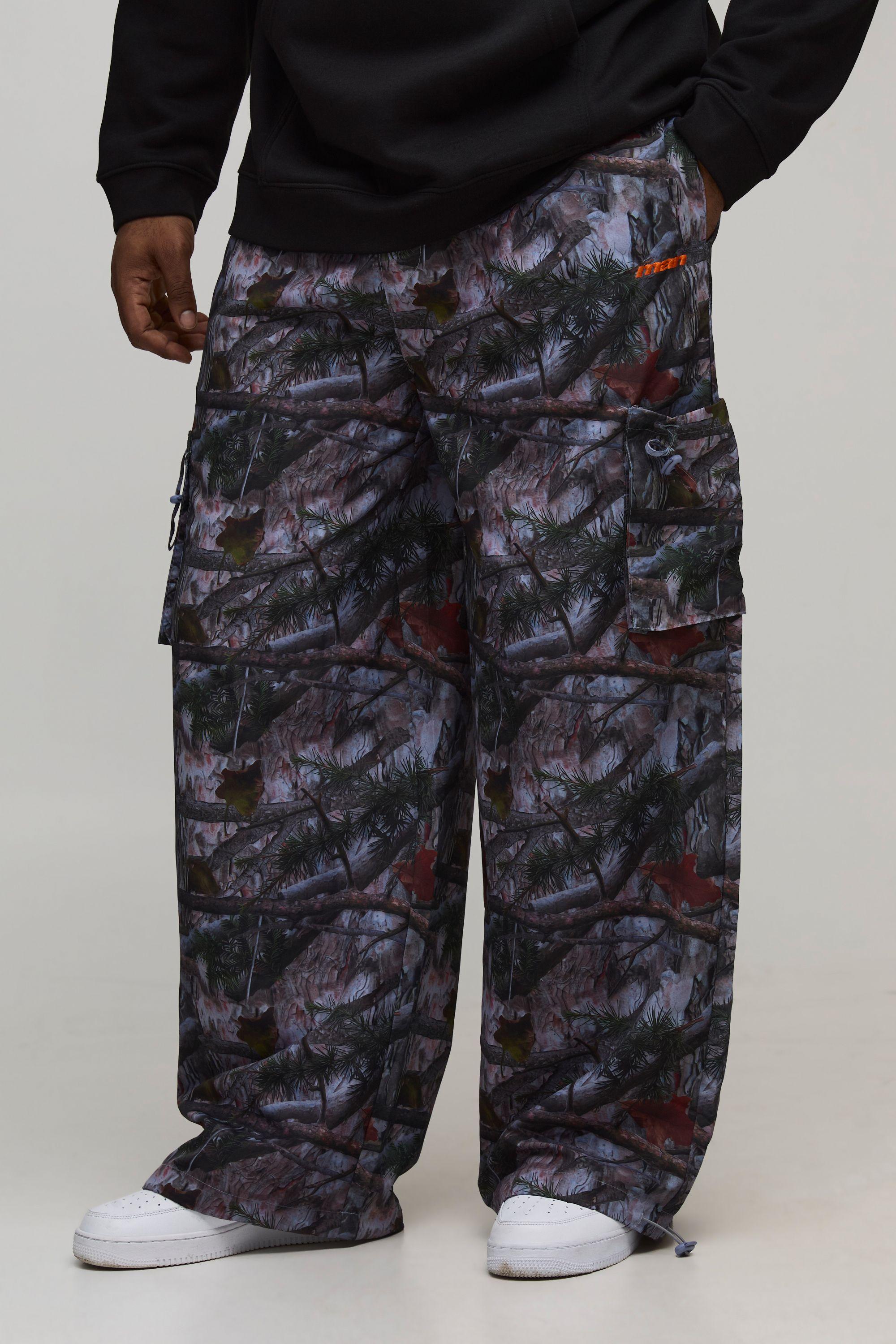 Plus Elasticated Waist Nylon Camo Baggy Trousers by BOOHOOMAN Plus Elasticated Waist Nylon Camo Baggy Trousers by BOOHOOMAN