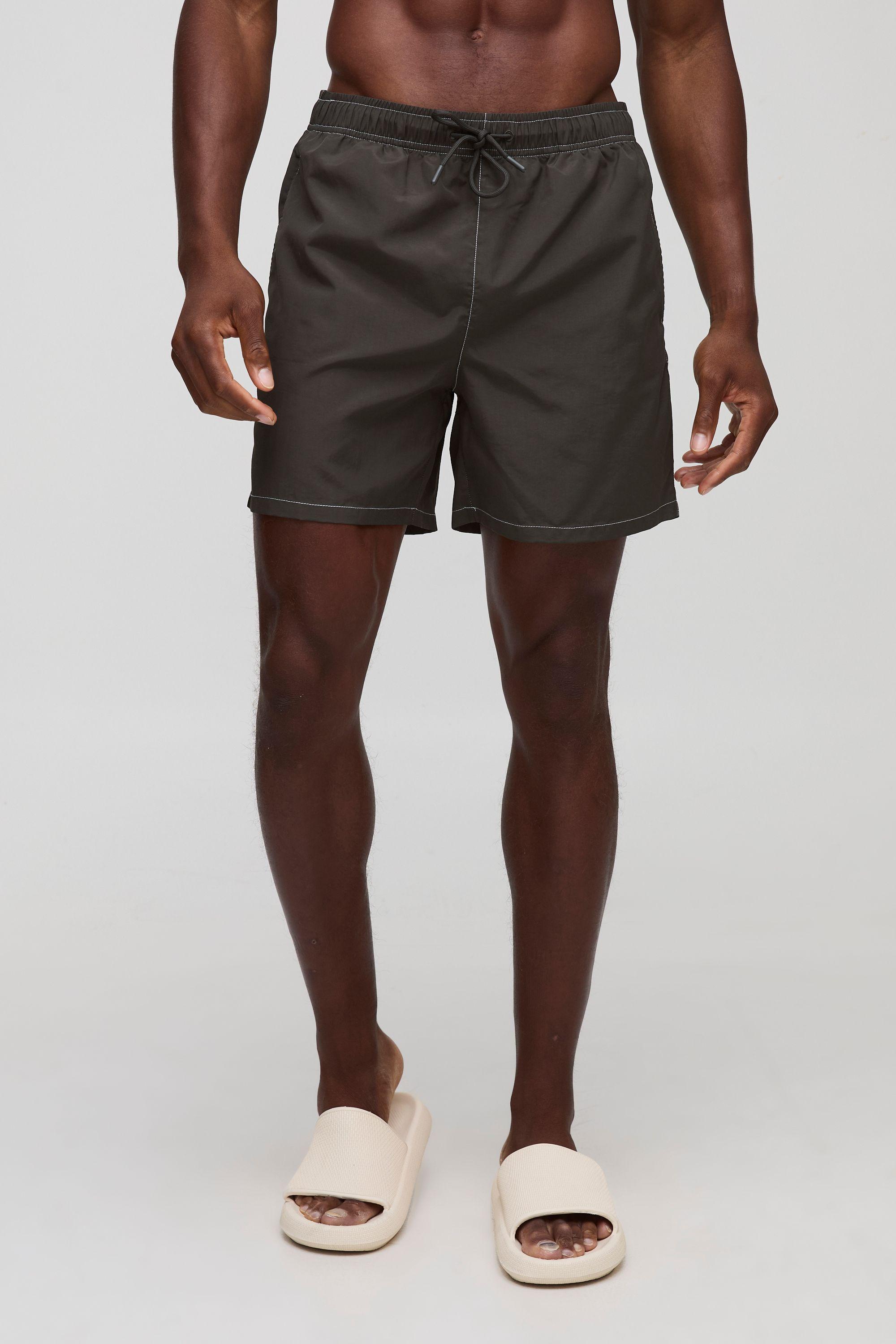 Regular Fit Mid Length Contrast Stitch Swim Short by BOOHOOMAN
