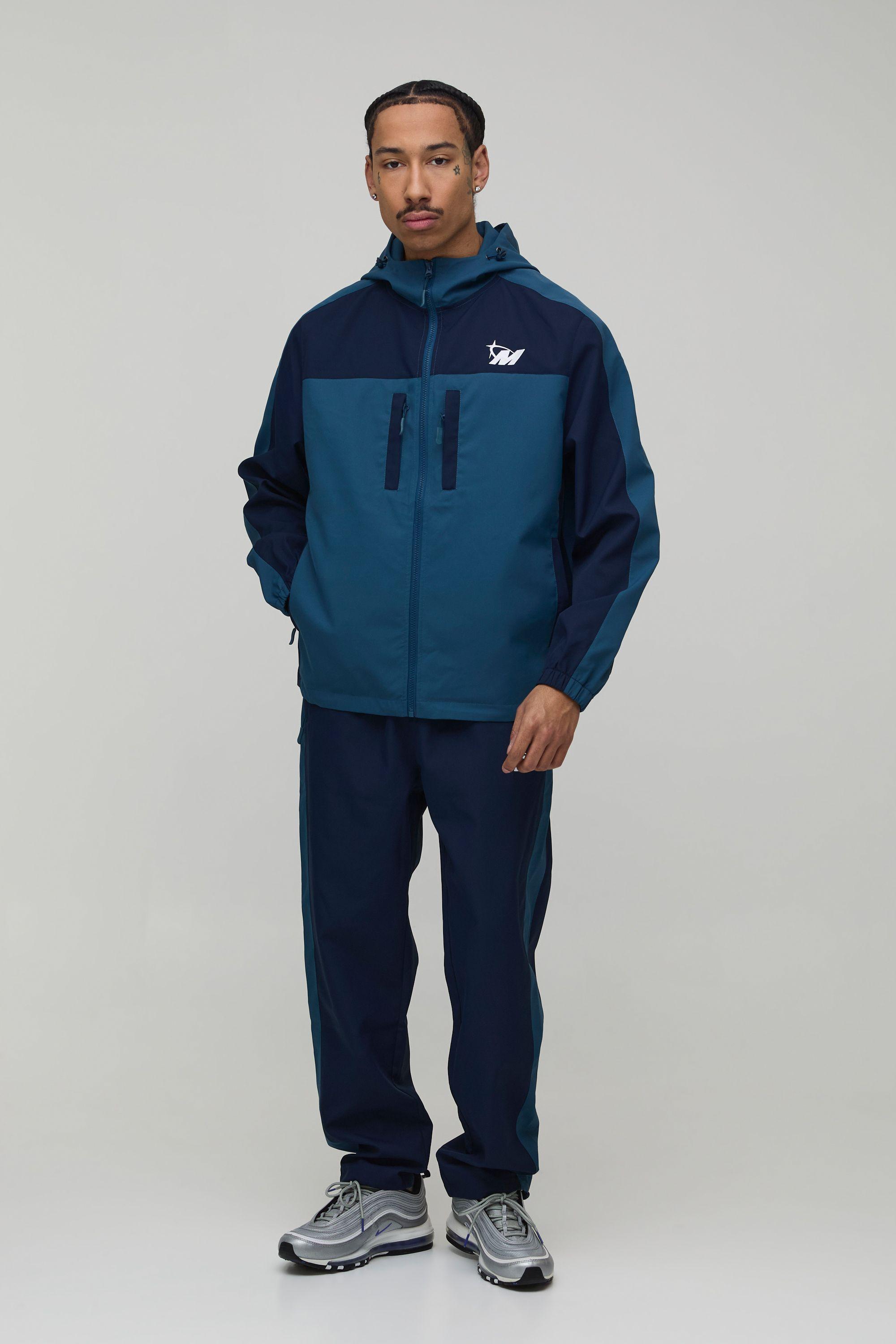 Regular Fit Soft Shell Panelled M Star Zip Funnel Hooded Tracksuit by BOOHOOMAN