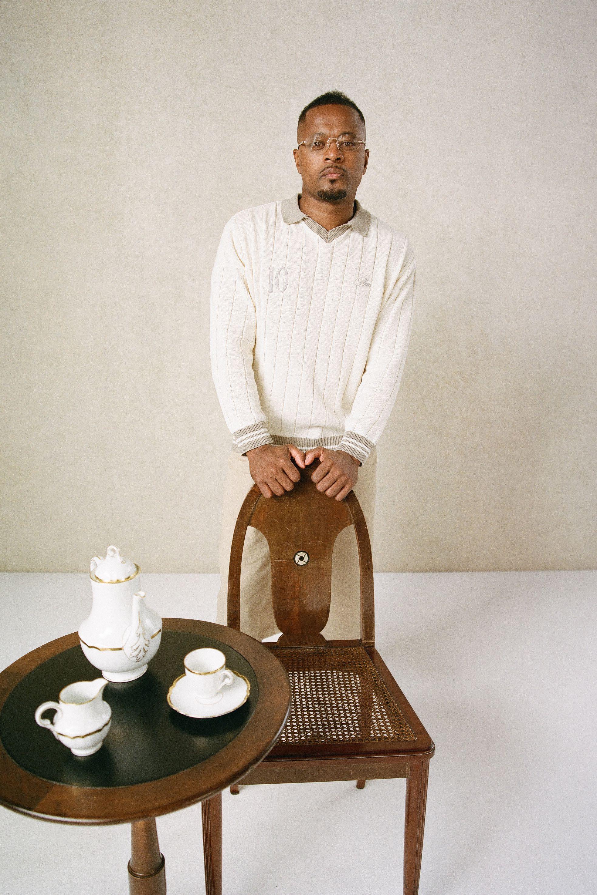Regular Fit V Neck Ribbed Knitted Polo by BOOHOOMAN