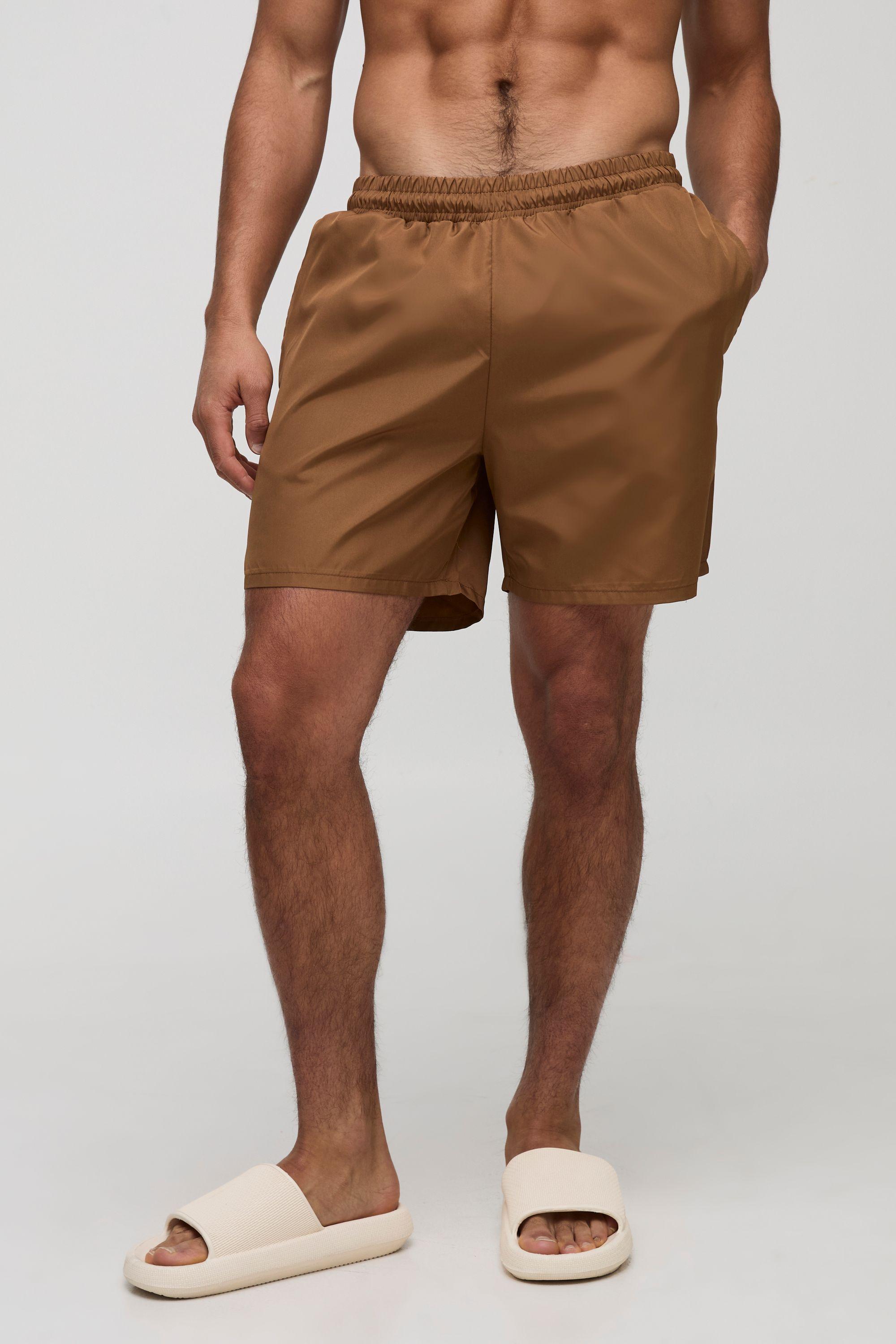 Regular fit Mid length Plain Swim Shorts by BOOHOOMAN