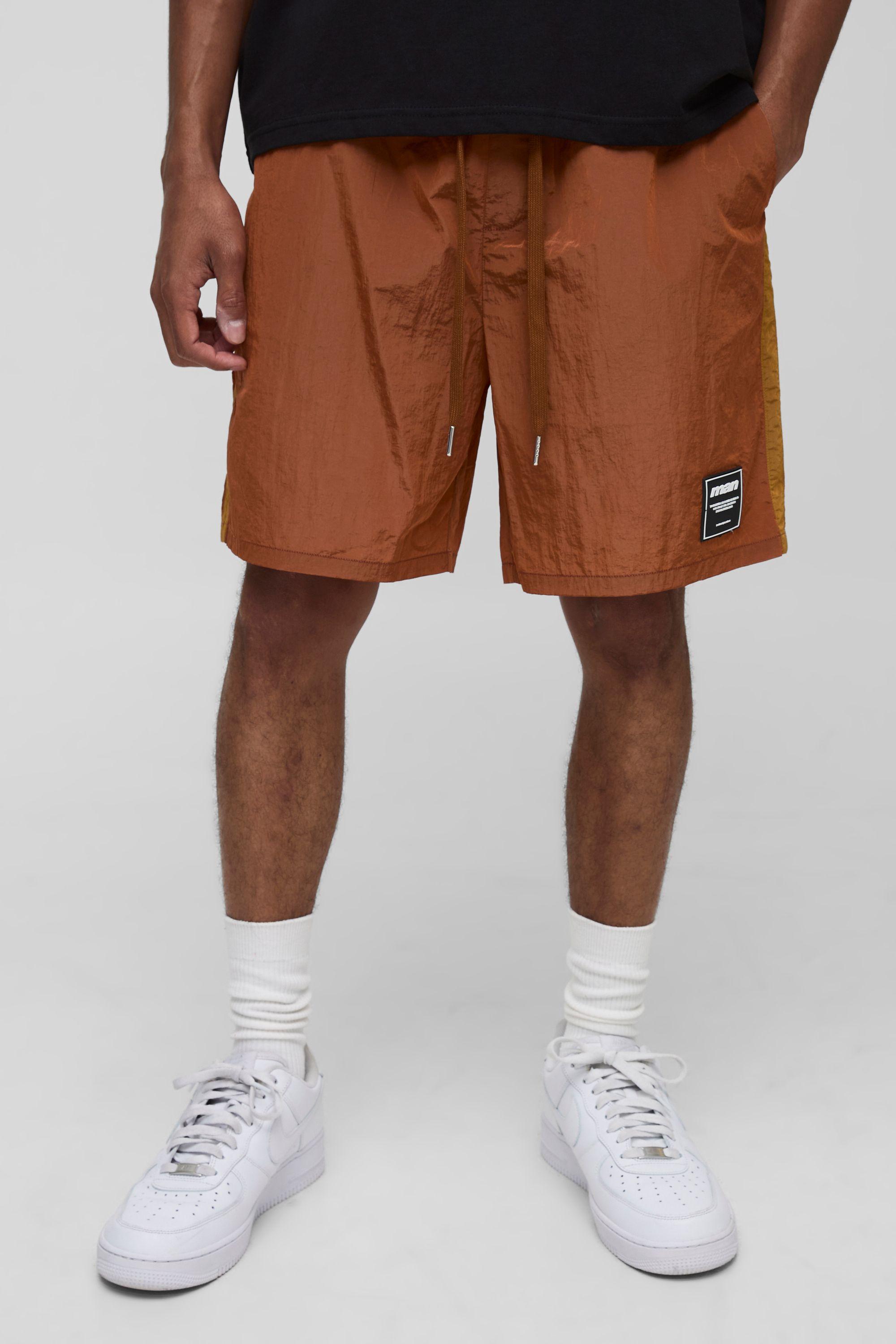 Relaxed Fit High Shine Crinkle Nylon Shorts by BOOHOOMAN