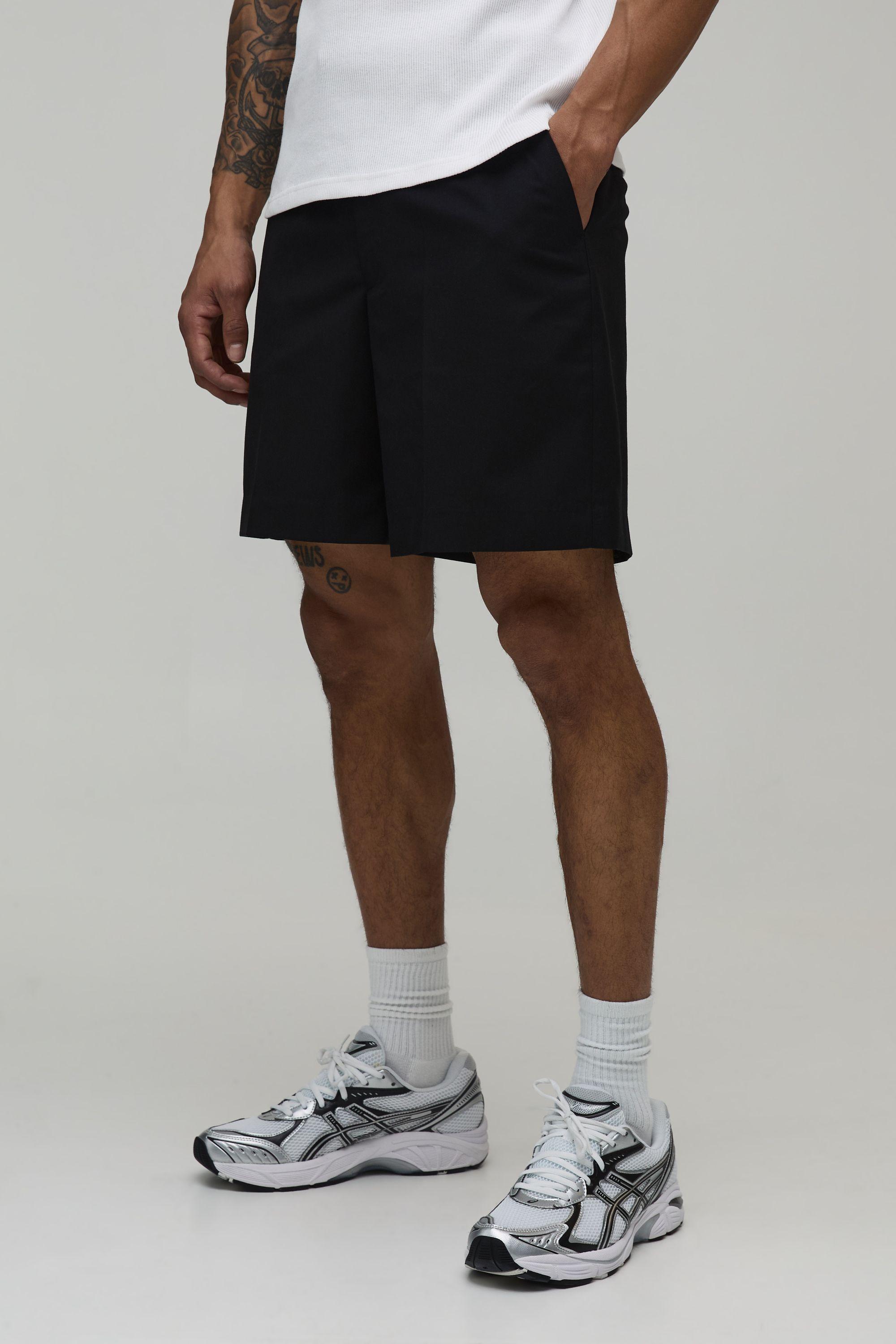 Relaxed Fit Short Length Tailored Shorts by BOOHOOMAN