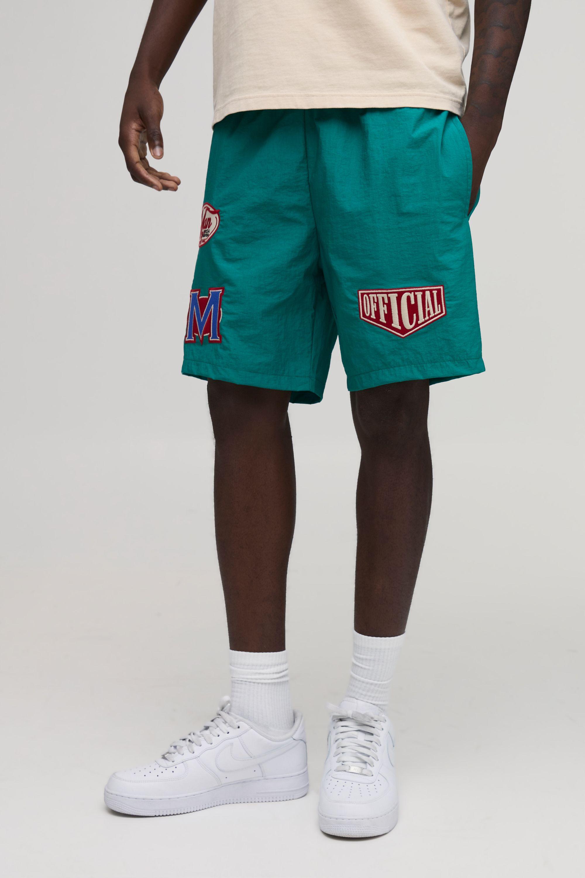 Relaxed Mid Length Multi Badge Nylon Short by BOOHOOMAN