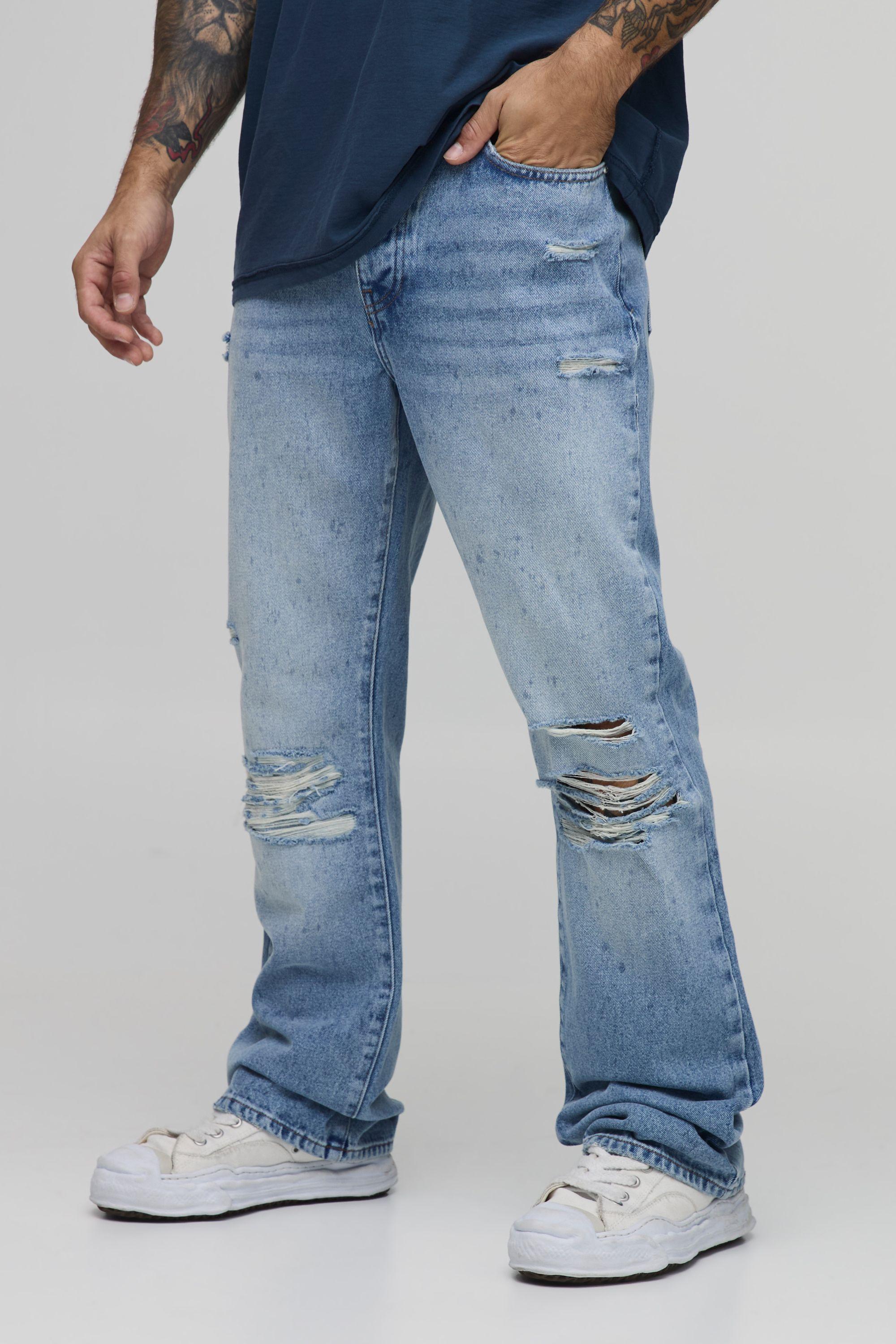Rip & Repair Busted Knee Flared Jeans by BOOHOOMAN Rip & Repair Busted Knee Flared Jeans by BOOHOOMAN