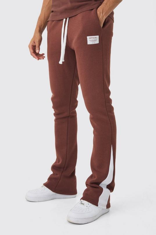 Slim Fit Flare Stacked Woven Tab Gusset Jogger by BOOHOOMAN