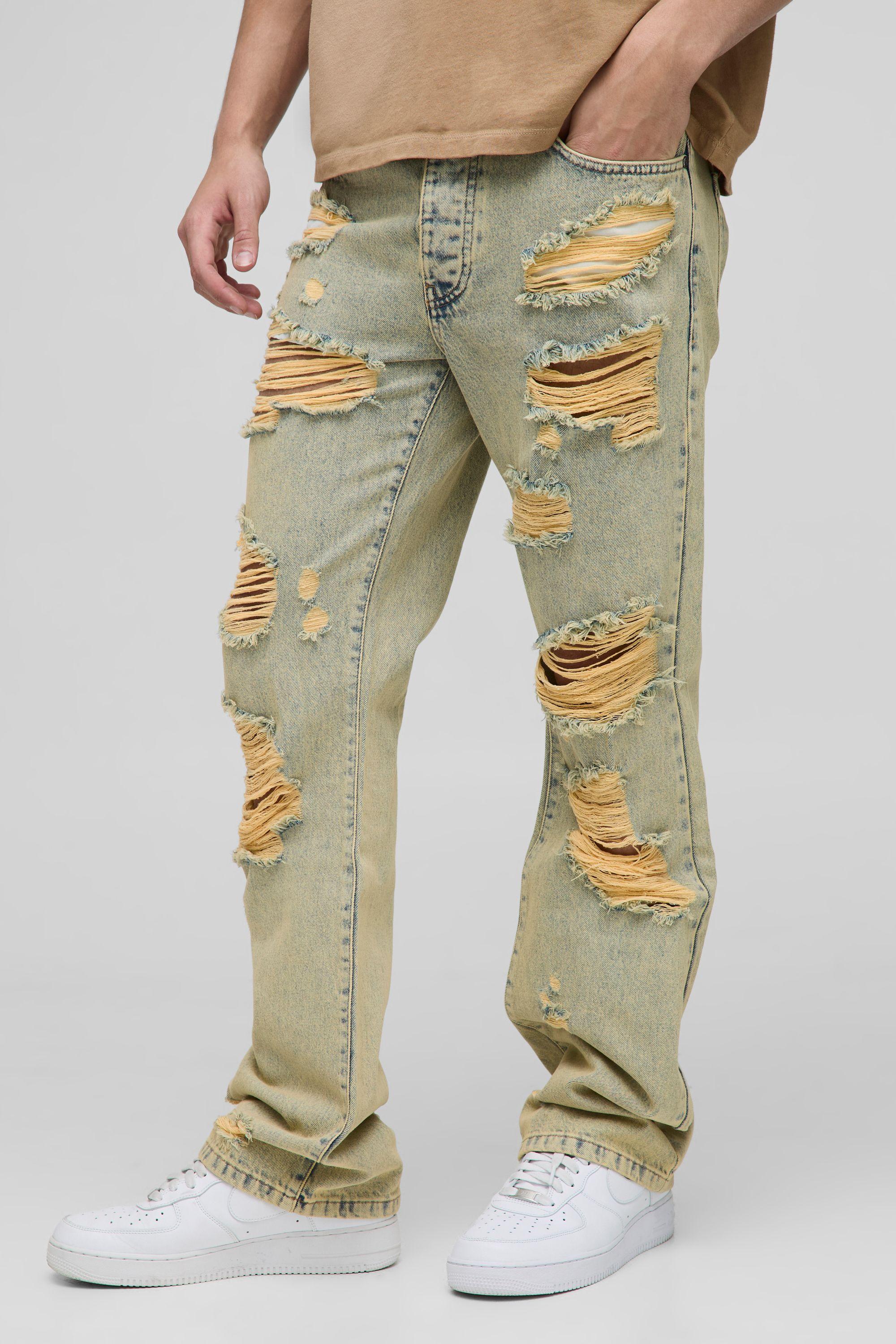 Slim Flared Knee Ripped Bleach Washed Jeans by BOOHOOMAN
