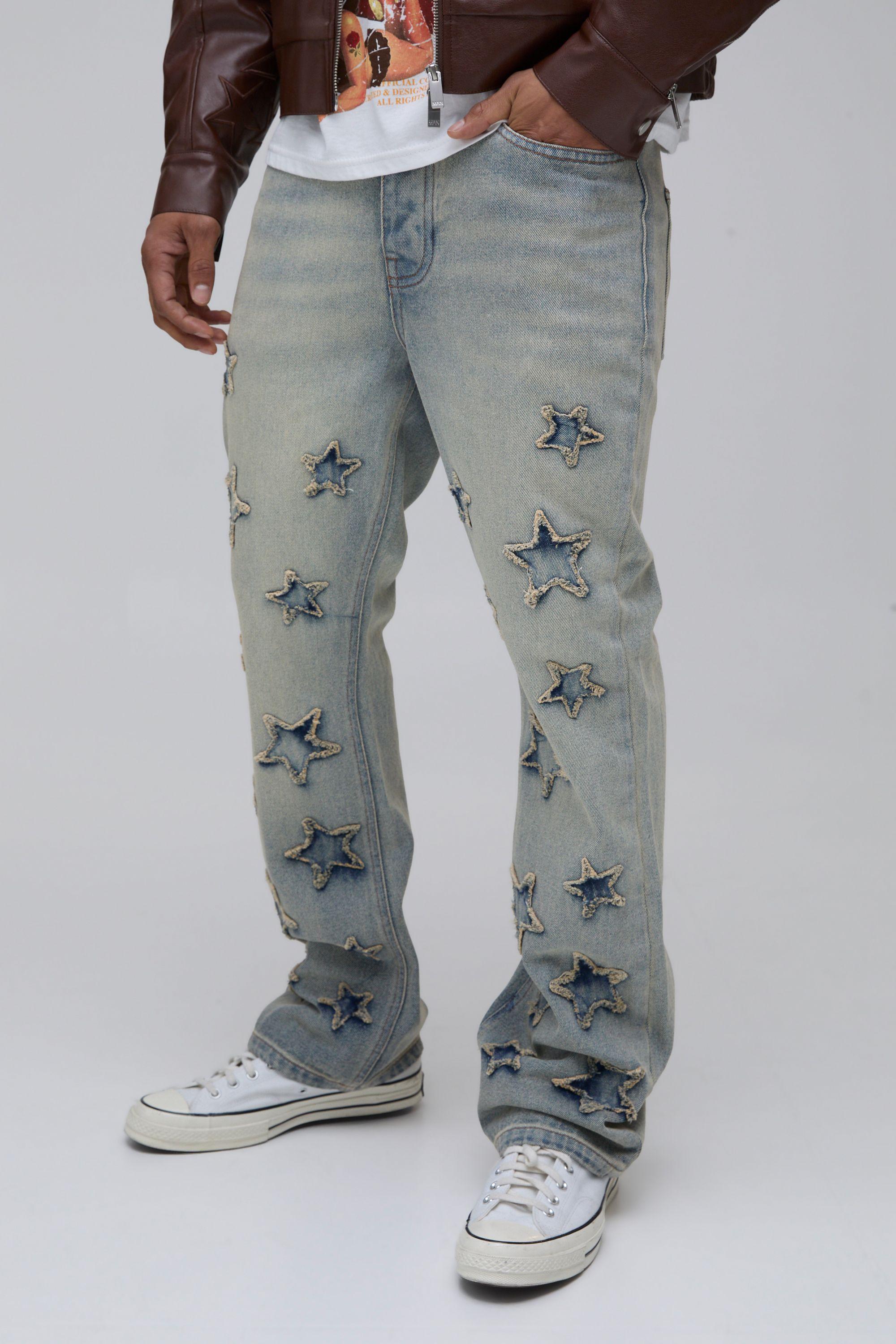 Star Applique Slim Flared Bleach Wash Jeans by BOOHOOMAN