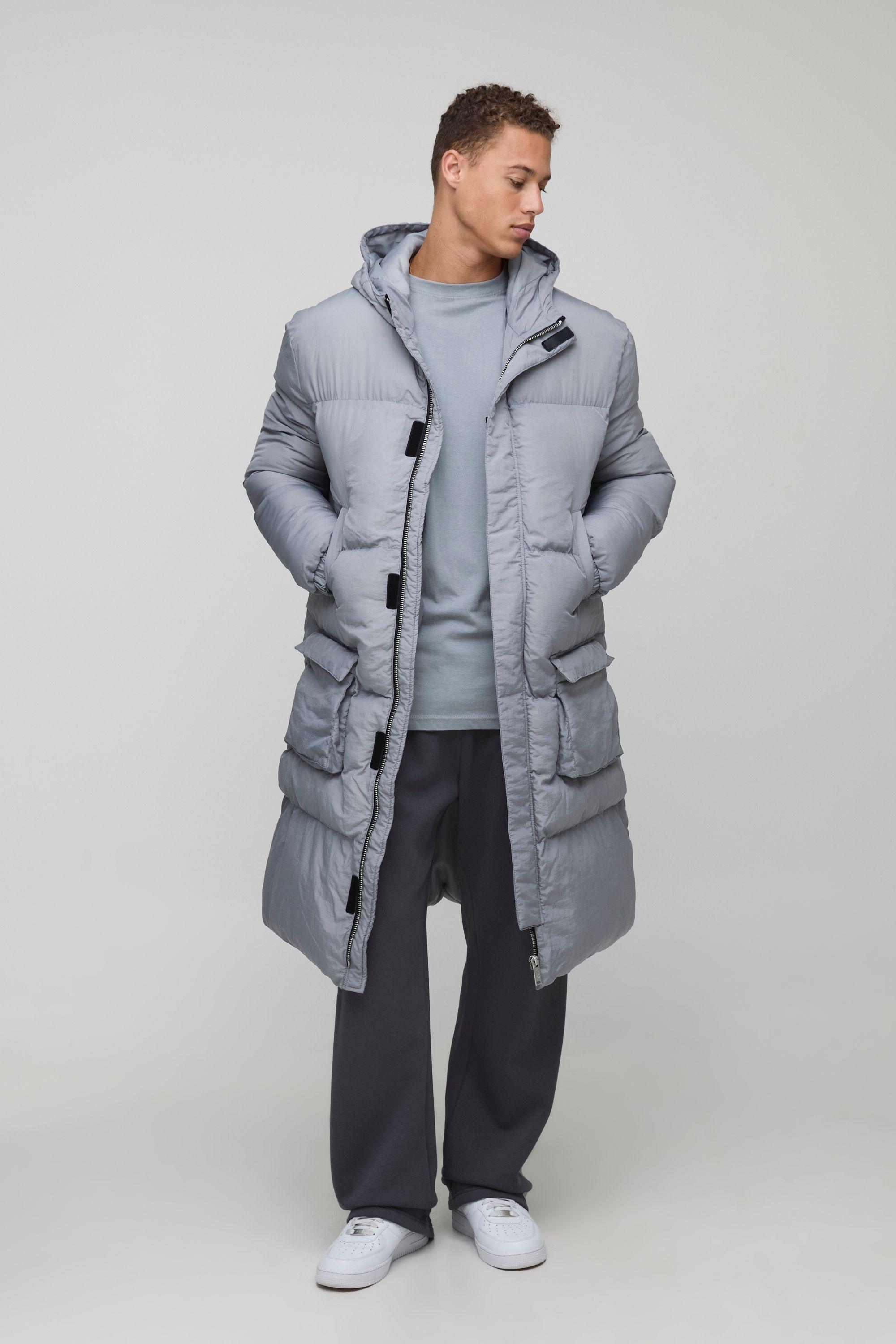 Tall 4 Pocket Longline Hooded Puffer Jacket in Black by BOOHOOMAN