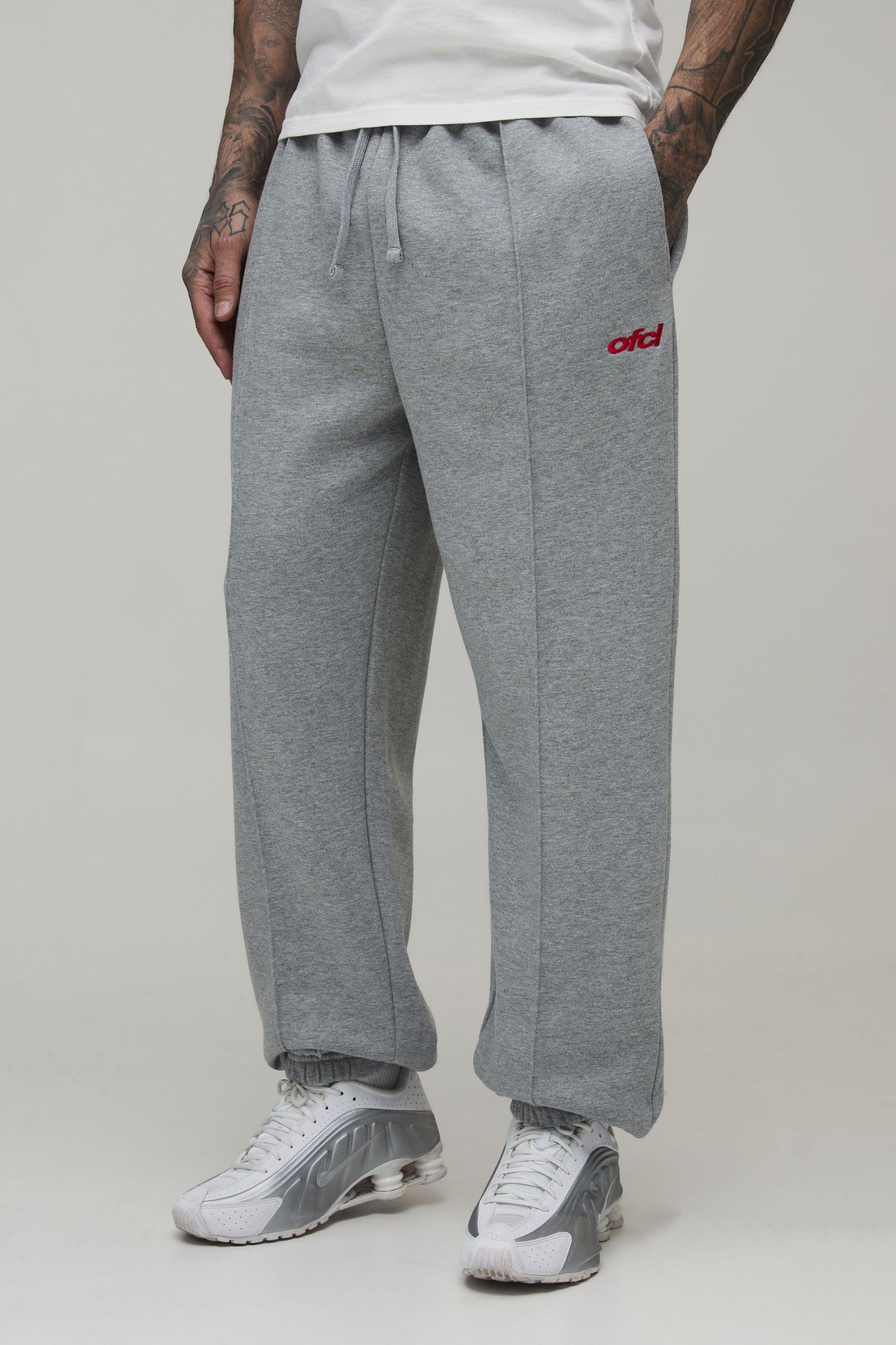 Tall Regular Fit Exposed Seam Embroidered Cuffed Jogger by BOOHOOMAN