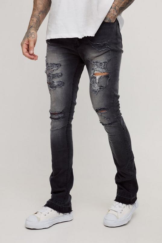 Tall Skinny Stretch Stacked Flared Ripped Jeans by BOOHOOMAN Tall Skinny Stretch Stacked Flared Ripped Jeans by BOOHOOMAN