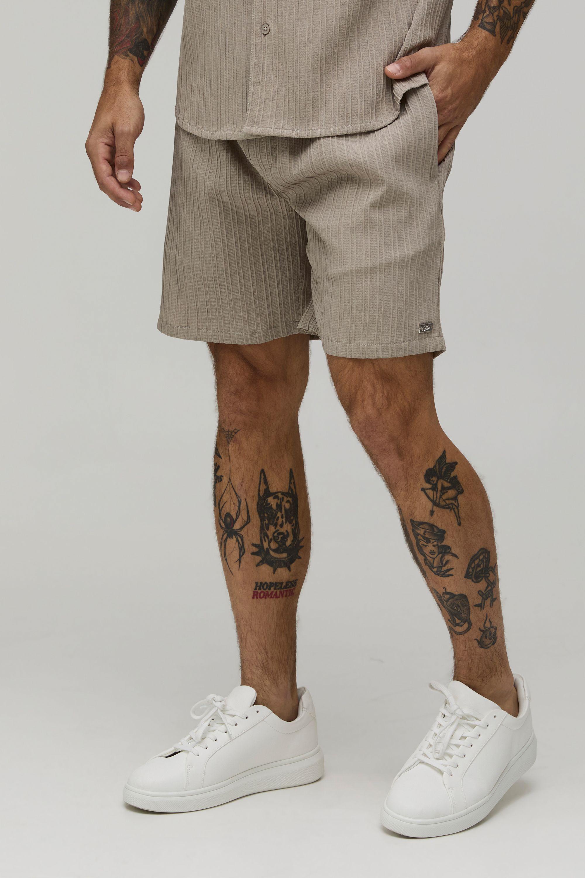 Textured Pleated Relaxed Fit Shorts by BOOHOOMAN