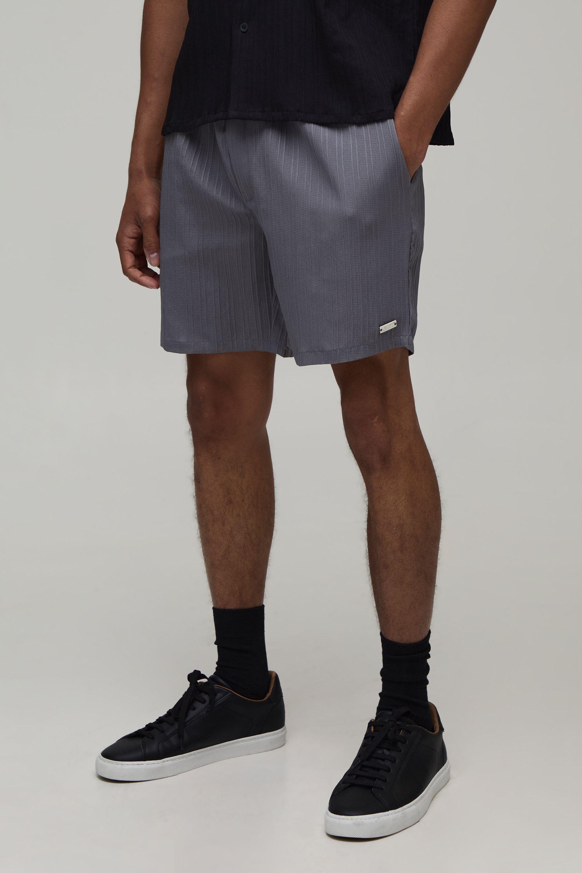 Textured Pleated Relaxed Fit Shorts by BOOHOOMAN