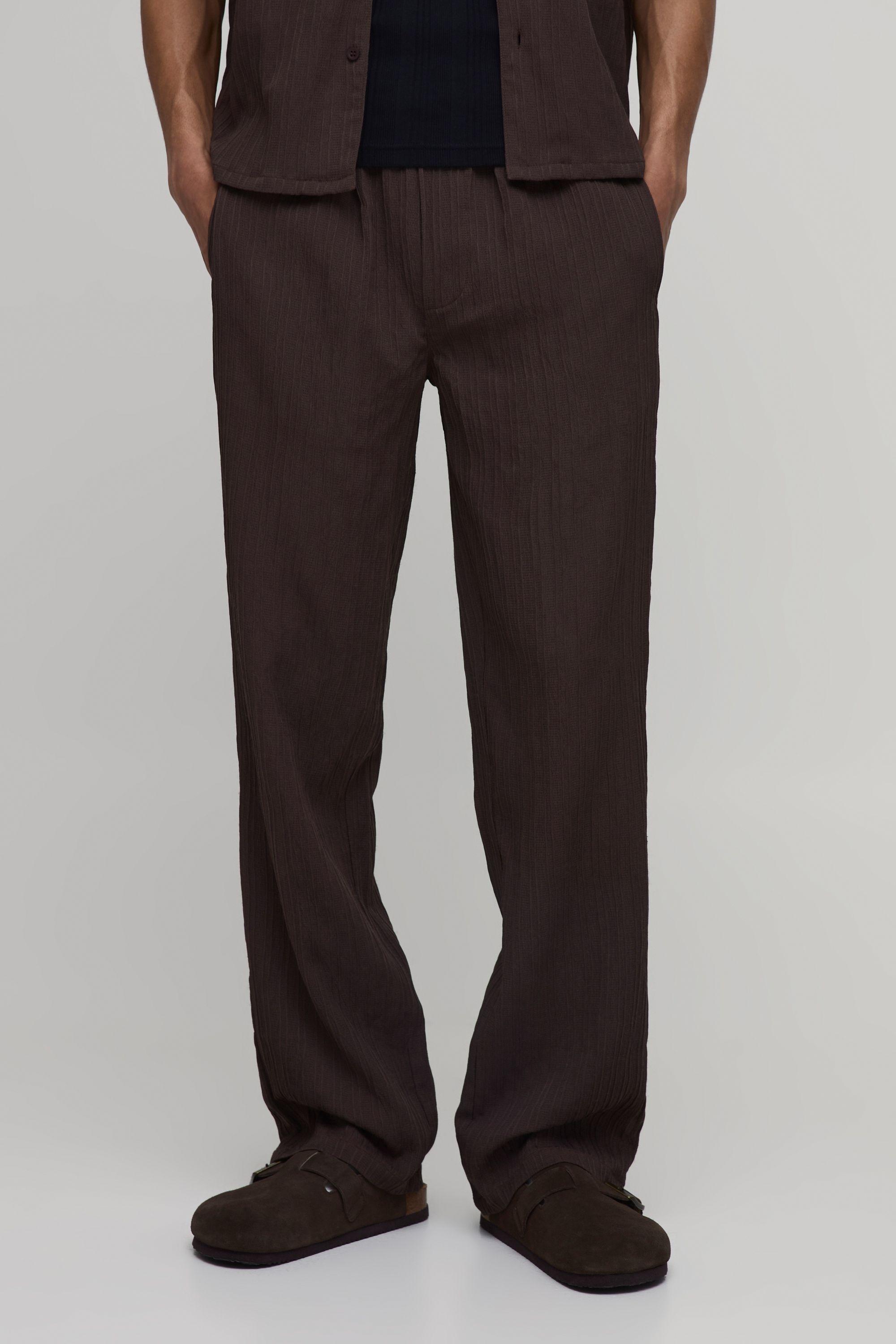 Textured Pleated Relaxed Fit Trousers by BOOHOOMAN