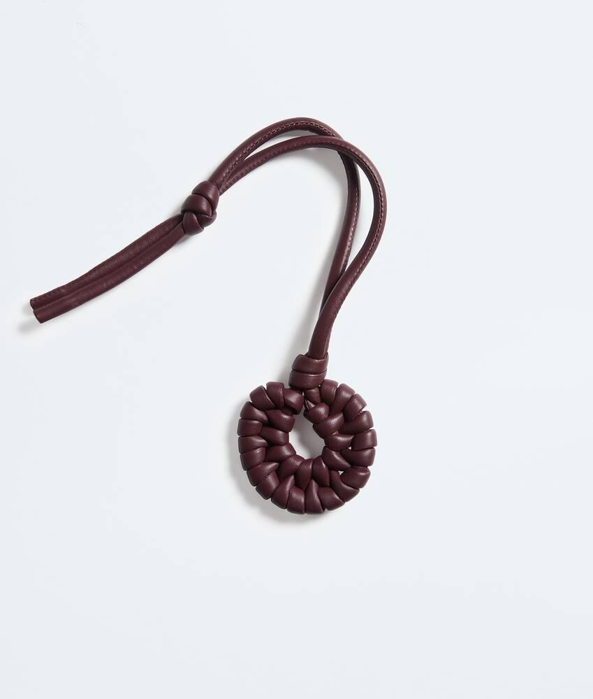 seashell knot charm
                            
                            
                                seashell knot charm by BOTTEGA VENETA
