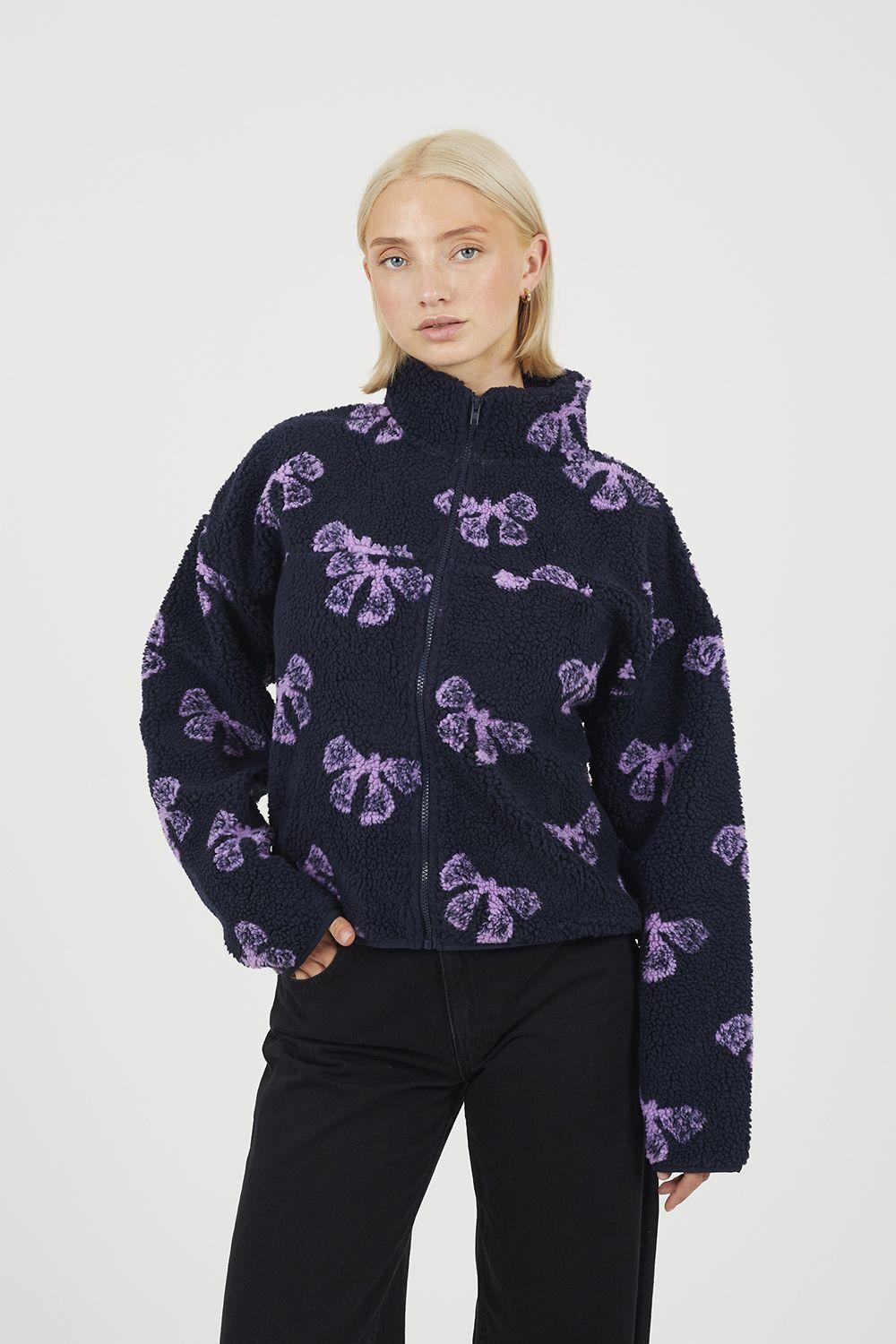 Graphic Bow Print Zip Through Sherpa Fleece by BRAVE SOUL