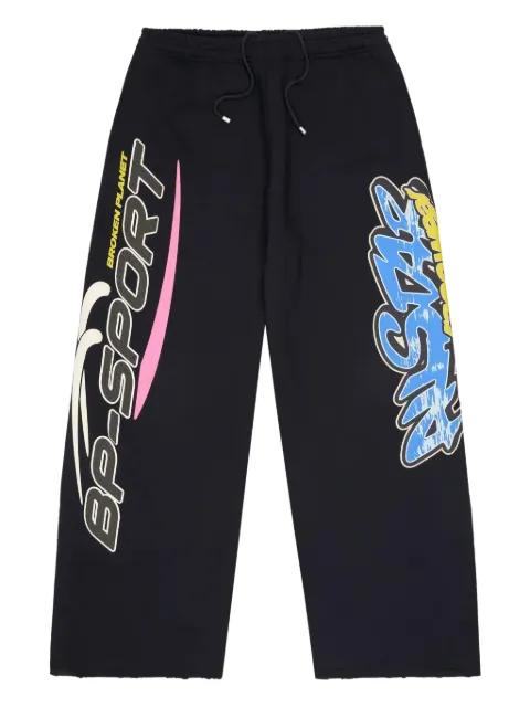 graphic-print track pants by BROKEN PLANET
