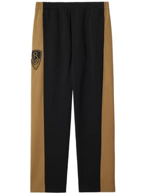 B Shield track pants by BURBERRY