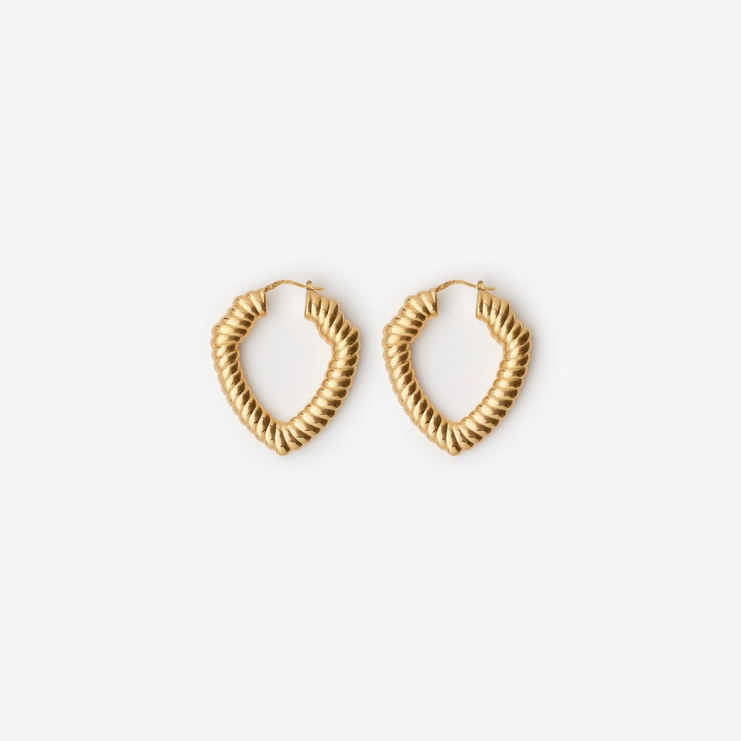 Large Shield Twisted Hoop Earrings​ by BURBERRY