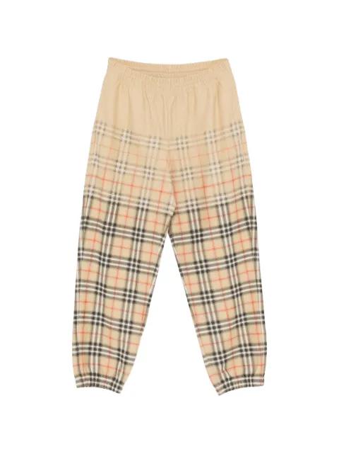 gradient check track pants by BURBERRY