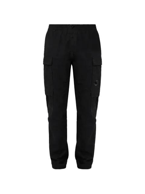 buttoned cargo pants by C.P. COMPANY