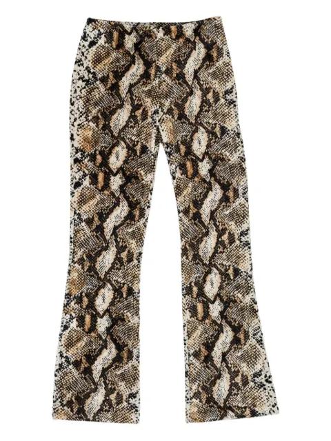 snake-print flared trousers by CALLIPYGIAN