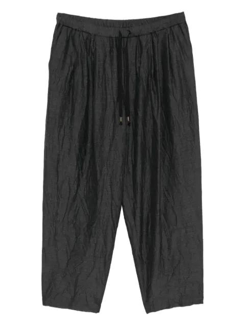 double pleated tapered trousers by CALMLENCE