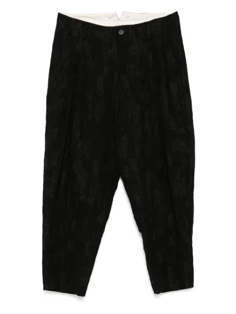 triple pleated tapered trousers by CALMLENCE