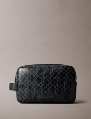 Allover Emblem Logo Zip Dopp Kit | Calvin Klein by CALVIN KLEIN