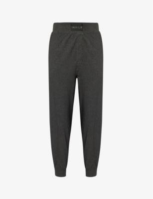 Brand-patch relaxed-fit  stretch-cotton trousers by CALVIN KLEIN