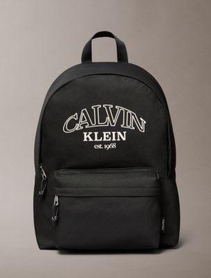 Curved Logo Graphic Round Backpack | Calvin Klein by CALVIN KLEIN