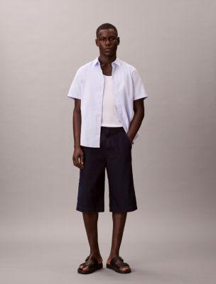 Lightweight Indigo Denim Long Shorts by CALVIN KLEIN