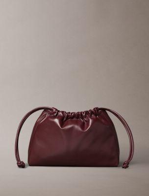 Monogram Drawstring Crossbody Bag | Calvin Klein by CALVIN KLEIN Monogram Drawstring Crossbody Bag | Calvin Klein by CALVIN KLEIN