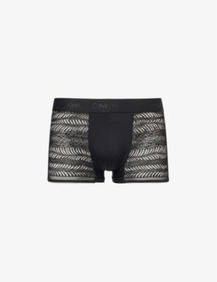 Open-weave low-rise stretch-woven trunks by CALVIN KLEIN