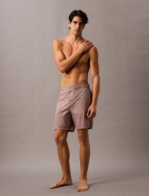 Solid 7" Swim Shorts by CALVIN KLEIN