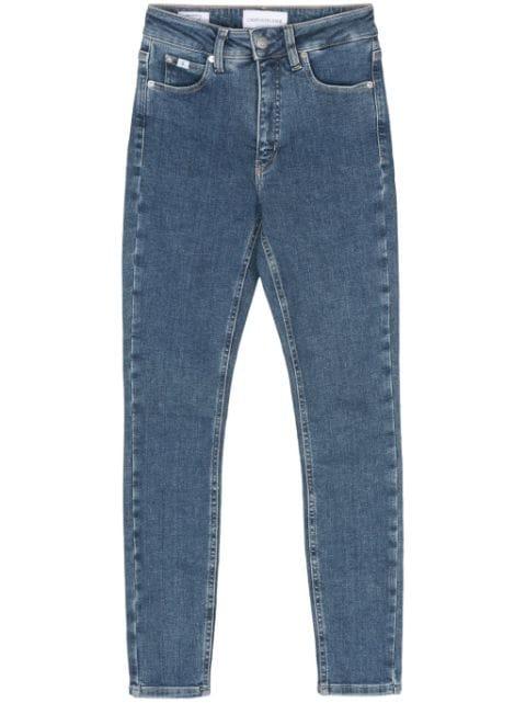 high-rise skinny jeans by CALVIN KLEIN