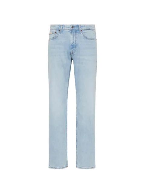 slim-fit logo-patch jeans by CALVIN KLEIN
