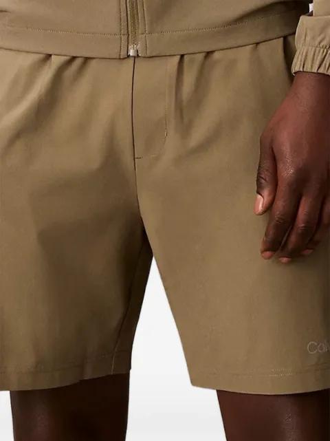 water-repellent performance shorts by CALVIN KLEIN