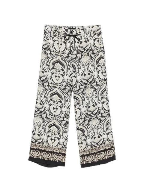 Adrienne baroque-print trousers by CAMBIO
