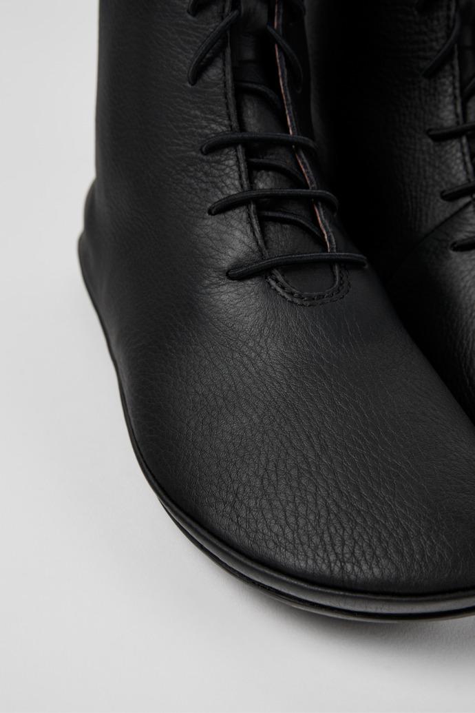 Right Black leather ankle boots by CAMPER