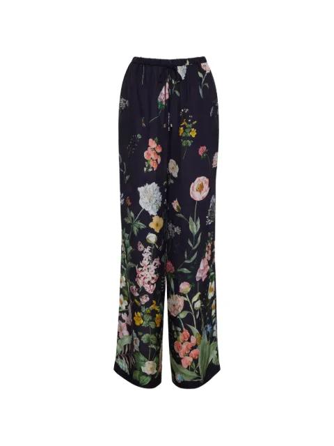 Girona floral-print trousers by CARA CARA
