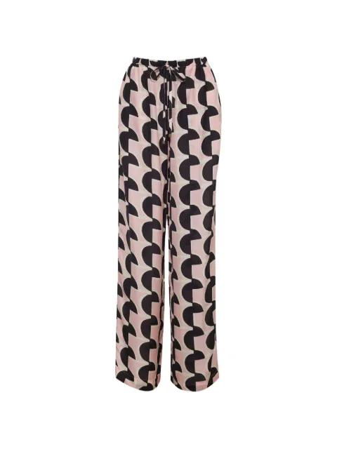 Girona geometric-pattern trousers by CARA CARA