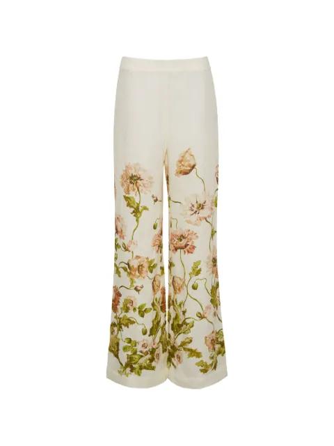 Sunflower floral-pattern trousers by CARA CARA