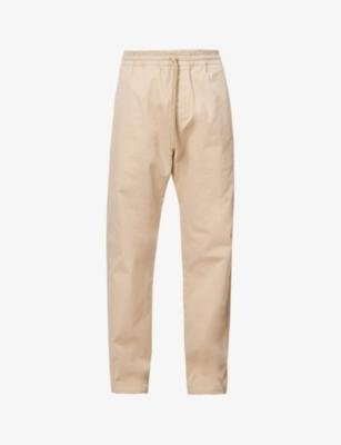 Lawton brand-patch relaxed-fit tapered-leg stretch-cotton trousers by CARHARTT WIP