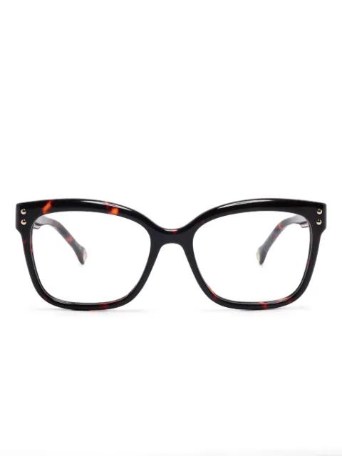 butterfly-frame glasses by CAROLINA HERRERA
