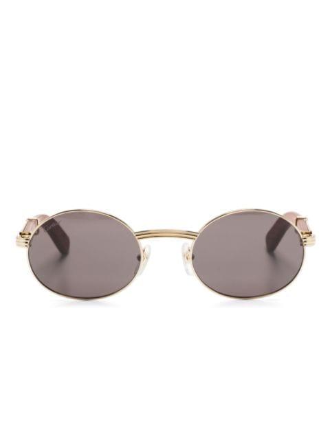 oval-frame sunglasses by CARTIER EYEWEAR