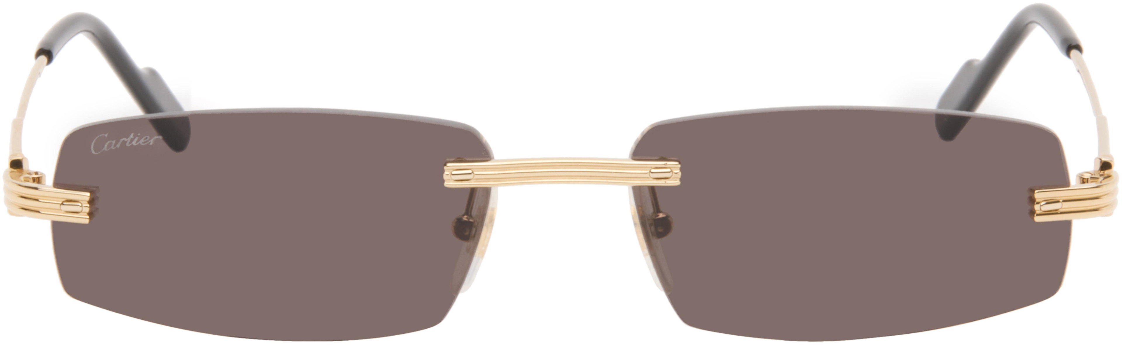 Gold 'Première de Cartier' Sunglasses by CARTIER