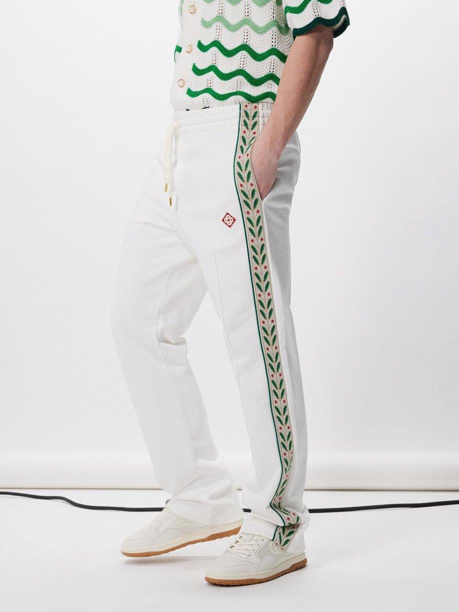 Laurel taped cotton-jersey track pants by CASABLANCA
