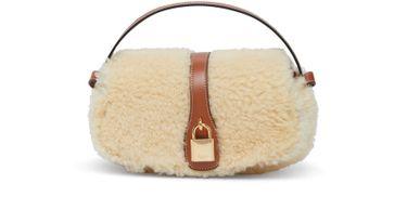 Clutch on strap in shearling and calfskin by CELINE